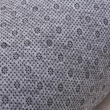 Le dessous anti dérapant de ce tapis