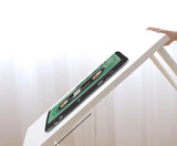 Tapis de salle de bain qui ne glisse pas sur table qui est panché