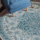 Tapis rond bleu clair ancien