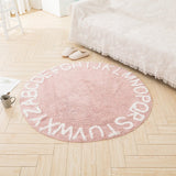 Tapis rond alphabet rose pour bébé