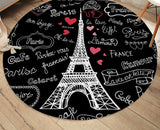 Tours eiffel blanche sur fond noir de ce tapis rond