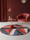 Tapis de salon rond chic géométrique rouge vert et noir