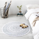 tapis rond mandala blanc evec des trait noir