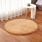 beige et la couleur de ce tapis rond