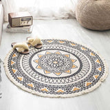 Tapis rond mandala orange et noir