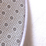 Cousinet en caoutchouc de ce tapis rond de lapin