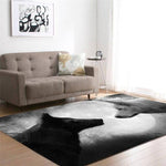 Loup noir et blanc sur un tapis de chambre