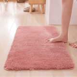 Joli couleur rose de ce tapis de bain