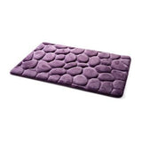 Violet est la joli couleur de ce petit tapis de salle de bain