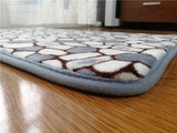 Grand tapis de salle de bain au dessin de galet avec une belle bordure bien cousu  