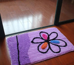 Tapis de salle de bain violet et fleur de couleur