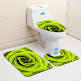 Des roses vertes et la couleur de ce tapis de toilette