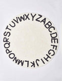 Photo du tapis ron dbébé alphabet noir et blanc