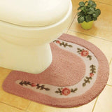 couleur rose pour ce tapis de toilette en U 