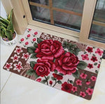 Plusieurs fleur notament des rose sur ce tapis de salle de bain