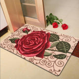 Tapis de salle de bain avec une grosse fleur rose au millieu de ce tapis