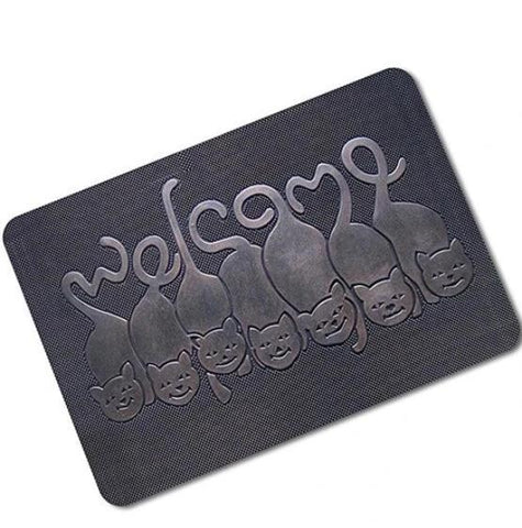 Tapis noir en cahouchouc avec dessin de chats vue de haut écrit 'welcome'avec leurs queues