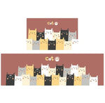 Le fameux tapis de cuisine marron avec les chat