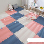 Blanc rose et bleu sont les couleur de ce super tapis pour bébé