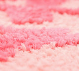 les fibres prise en photo en grand de ce tapis de sol pour chambre fille