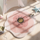 ce tapis de chambre pour fille plutôt rond représente le centre d'une fleur de pavot