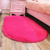 Tapis de chambre rose foncé ovale 