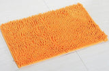 jolie couleur orange ce tapis de bain microfibre 