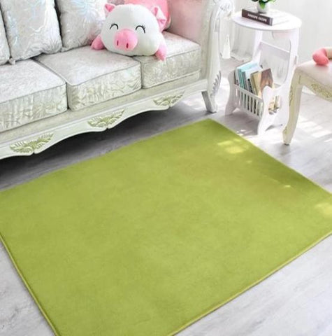 Vert est la couleur de ce super tapis de salon