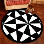tapis rond noir et blanc illusion d'optique
