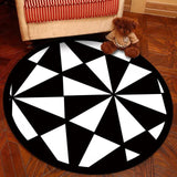 tapis rond noir et blanc illusion d'optique