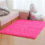 tapis de salon de couleur rose 