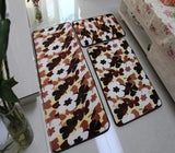 Trois varientes de tapis de bain principalement des fleur de différentes couleurs