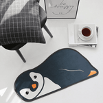 tapis d'entrée motif pingoin et forme de pingoin