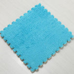 couleur turquoise pour cette dalle de tapis puzzle mousse velour