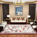 tapis de salon japonais, branches de cerisier et poissons rouge sur fond beige présenté dans salon tipyque