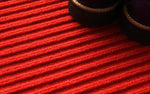 Zoom sur les fibres de ce tapis